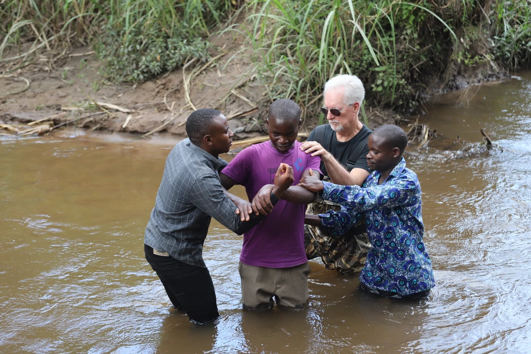 David Bryant and others baptizing a mam
